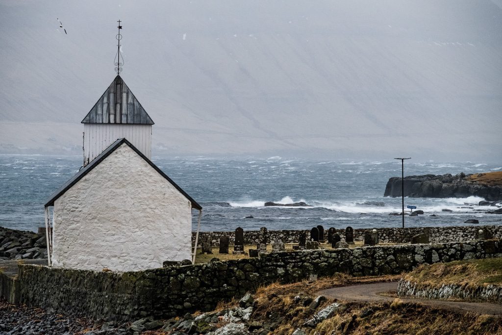 Church on the ocean in Kirkjubøur (Faroe Islands)